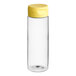 A clear plastic cylinder with a yellow lid.