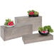 A Cal-Mil rectangular gray pine display riser holding wooden boxes of vegetables and fruit.