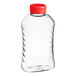 A clear PET ribbed hourglass honey bottle with a red heat induction seal cap.