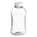 An 11 oz. clear ribbed PET honey bottle with a white plastic flip top lid.