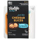 A package of Violife Just Like Cheddar Vegan Cheese Slices on a counter.