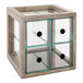 A gray pine bread display case with four drawers and glass panels with black knobs.