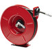 A red Reelcraft Series 7000 hose reel with a hose attached.