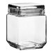 An Acopa clear glass jar with a lid.