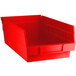 A Regency red plastic shelf bin.