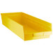 A yellow plastic Regency shelf bin with a handle.