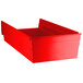 A Regency red plastic shelf bin with a handle.