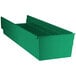 A green Regency shelf bin with two compartments.