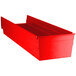 A red plastic bin with compartments.