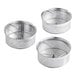 Three metal strainer baskets for the Garde Heavy-Duty Stainless Steel Rotary Food Mill.