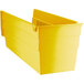 A yellow Regency shelf bin with two compartments.