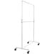 A white metal clothing rack stand with wheels and a white frame with a hangrail attachment.