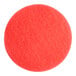 A red circular Lavex Basics floor machine pad.