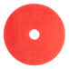 A red Lavex Basics buffing pad with a hole in the middle.