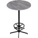 A round Holland Bar Stool outdoor bar table with a metal base and a grey top.