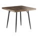 A Lancaster Table & Seating Mid-Century square butcher block table with espresso finish on black legs.