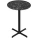A black marble Holland Bar Stool EuroSlim round bar height table with a black metal base.