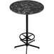 A black marble Holland Bar Stool bar height table with metal foot rest base.