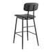 A Lancaster Table & Seating black barstool with black vinyl padded seat and backrest.