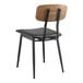 A Lancaster Table & Seating mid-century wood chair with a black seat.