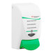 A white and green SC Johnson Professional Restore 1 liter skin moisturizing cream dispenser.