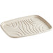 A white tray with a wavy pattern.