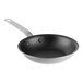 A close-up of a Vollrath stainless steel frying pan with a black and white CeramiGuard II coating and plated handle.