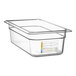 A clear rectangular Carlisle polycarbonate food pan with a label.