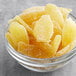 A bowl of crystallized ginger pieces.