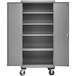 A gray Durham steel mobile storage cabinet with shelves.