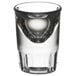 A close-up of a Libbey tall shot glass with a white background.