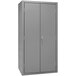 A grey metal Durham storage cabinet with two doors and a lock.