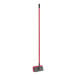A black Lavex bi-level floor scrub brush with red bristles and a red squeegee on a metal handle.