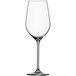 A close-up of a clear Schott Zwiesel Fortissimo Bordeaux wine glass with a long stem.