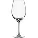 A close-up of a clear Schott Zwiesel Ivento red wine glass with a stem.