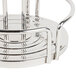 A Tablecraft stainless steel condiment caddy tray with rings on a metal stand.