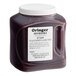 A container of Oringer Seeded Black Raspberry Dessert / Sundae Topping with a label.