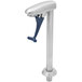 A stainless steel deck mount glass filler with a dark blue push-back actuation arm.