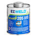 A white and blue can of E-Z Weld Clear Regular Body PVC Cement.