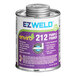 A 16 oz. can of E-Z Weld purple PVC primer with a white label.