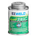 A can of E-Z Weld clear PVC cement with a label.