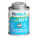 A can of E-Z Weld medium body wet weld PVC cement with a dark blue label.