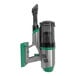 A green and silver Bissell Commercial vacuum cleaner.