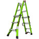A green Little Giant Conquest 2.0 ladder with black handles.