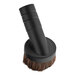 A black plastic brush with brown bristles and a black base.