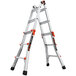 A Little Giant aluminum ladder with orange handles.