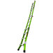 A green Little Giant Conquest 2.0 articulated ladder with black handles.