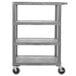 A grey plastic serving cart with four shelves and wheels.