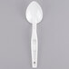A white plastic spoon with a white handle.