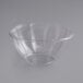 A clear plastic Stalk Market salad bowl with a curved edge.